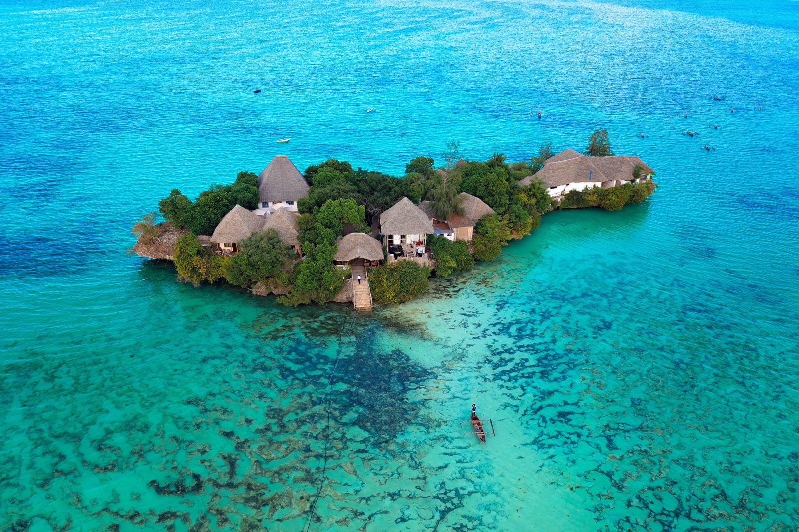 Pongwe Island surrounded by turquoise waters